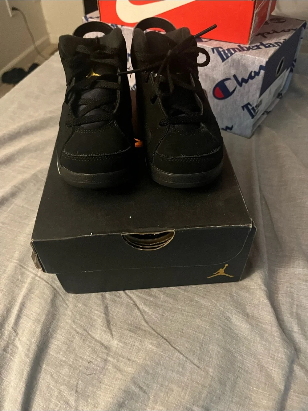 Jordan Kids Black High-Top Sneakers with Gold Accent